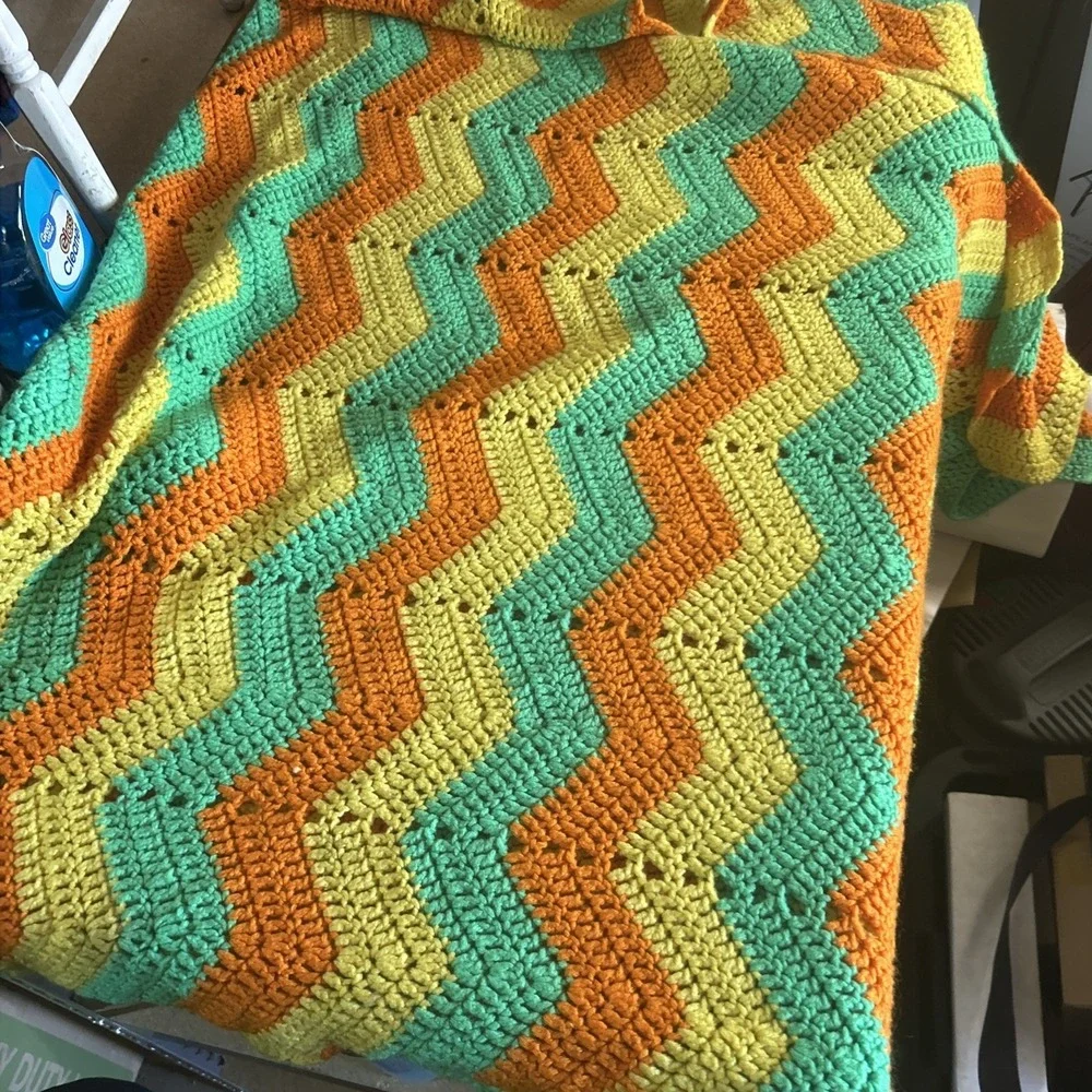 a vintage handmade crochet ripple or chevron pattern blanket 50